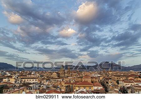 Stock Image - Clouds over cityscape, Palermo, Sicily, Italy. Fotosearch