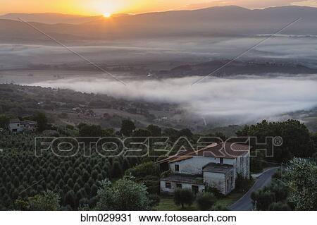 Early morning valley fog, Monte Castello di Vibio, Umbria, Italy View Large Photo Image Stock Image - Early morning valley fog, Monte Castello di Vibio, Umbria, Italy. Fotosearch