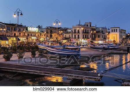 Picture - Harbor and town at dusk, Mondello, Sicily, Italy. Fotosearch