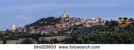 Stock Image - Hillside town at dawn, Todi, Umbria, Italy. Fotosearch