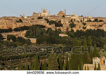 Stock Photograph - Hilltop town at dusk, Orvieto, Umbria, Italy. Fotosearch
