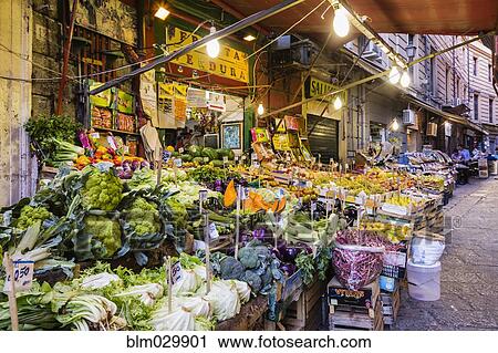 Stock Image - Market stalls at dawn, Palermo, Sicily, Italy. Fotosearch