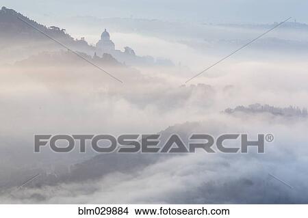 Morning fog over hills and town, Todi, Umbria, Italy, View Large Photo Image Picture - Morning fog over hills and town, Todi, Umbria, Italy, . Fotosearch