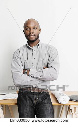 Portrait of confident Black architect in office View Large Photo Image Stock Image - Portrait of confident Black architect in office. Fotosearch