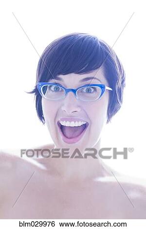 Stock Photograph - Portrait of surprised woman in eyeglasses. Fotosearch