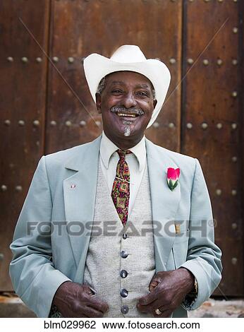 Portrait of well-dressed Black man View Large Photo Image Stock Image - Portrait of well-dressed Black man. Fotosearch
