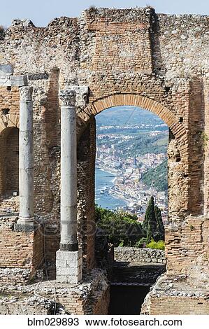 View through arch of Ancient Greek Theatre ruins, Taormina, Sicily, Italy View Large Photo Image Stock Image - View through arch of Ancient Greek Theatre ruins, Taormina, Sicily, Italy. Fotosearch