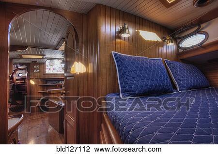 Bed in boat cabin View Large Photo Image Stock Image - Bed in boat cabin. Fotosearch