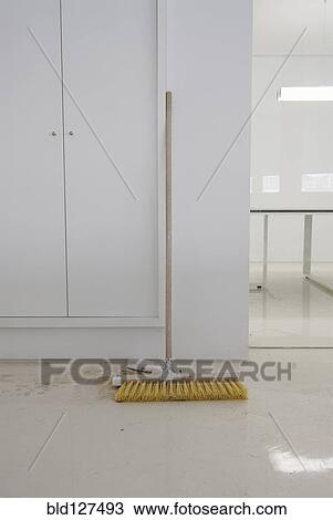 Broom in office View Large Photo Image Stock Image - Broom in office. Fotosearch