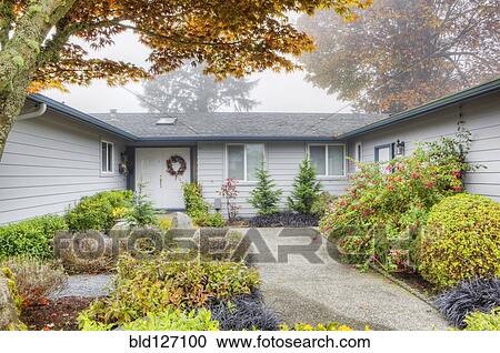 Bushes lining walkway to house View Large Photo Image Stock Image - Bushes lining walkway to house. Fotosearch