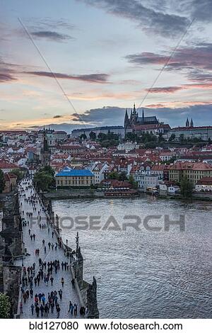 Charles Bridge, Prague Castle and cityscape at sunset, Prague, Czech Republic View Large Photo Image Stock Image - Charles Bridge, Prague Castle and cityscape at sunset, Prague, Czech Republic. Fotosearch