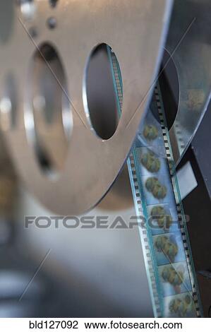 Close up of film and reel View Large Photo Image Stock Image - Close up of film and reel. Fotosearch