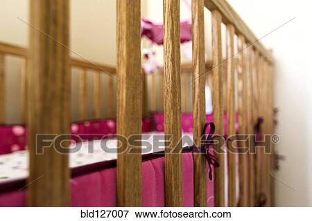 Close up of wooden slats on crib View Large Photo Image Stock Photo - Close up of wooden slats on crib. Fotosearch