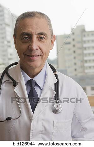Close up portrait of Hispanic doctor View Large Photo Image Picture - Close up portrait of Hispanic doctor. Fotosearch