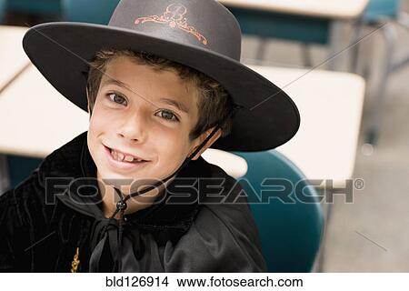 Close up portrait of mixed race boy in costume View Large Photo Image Picture - Close up portrait of mixed race boy in costume. Fotosearch