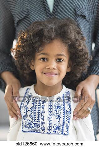 Close up portrait of smiling African American girl View Large Photo Image Stock Image - Close up portrait of smiling African American girl. Fotosearch