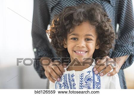 Close up portrait of smiling African American girl View Large Photo Image Stock Photo - Close up portrait of smiling African American girl. Fotosearch
