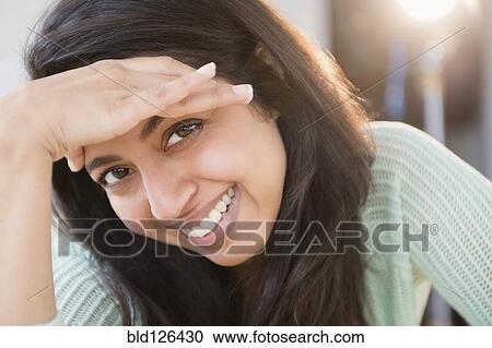 Close up portrait of smiling Asian woman View Large Photo Image Stock Image - Close up portrait of smiling Asian woman. Fotosearch