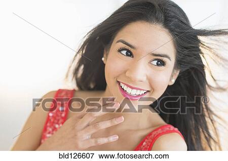 Close up portrait of smiling Hispanic woman View Large Photo Image Stock Photo - Close up portrait of smiling Hispanic woman. Fotosearch