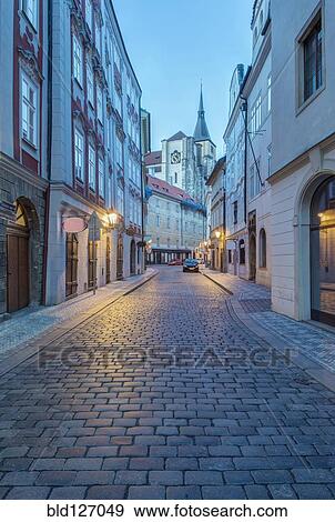 Stock Photo - Cobblestone street at dawn, Prague, Czech Republic. Fotosearch