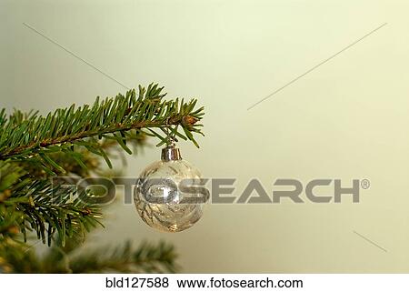 Stock Photo - Decoration on Christmas tree close-up. Fotosearch