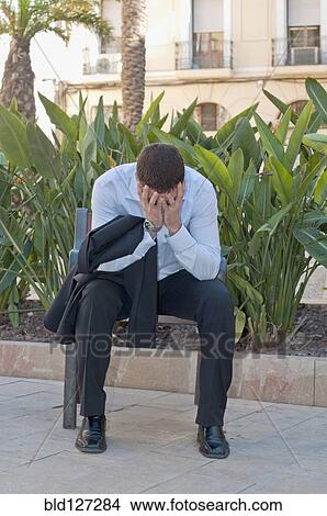 distraught man on park bench View Large Photo Image Picture - distraught man on park bench. Fotosearch