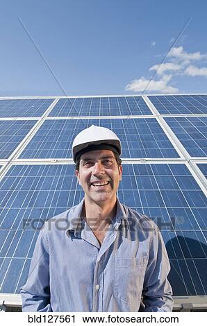 engineer in front of solar panels View Large Photo Image Stock Image - engineer in front of solar panels. Fotosearch