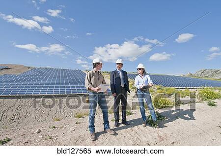 Stock Photography - engineers and businessman in solar plant . Fotosearch