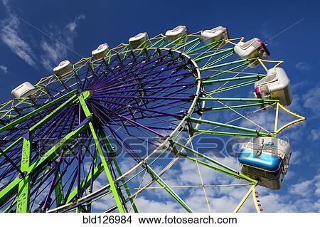 Ferris Wheel ride at amusement park View Large Photo Image Picture - Ferris Wheel ride at amusement park. Fotosearch