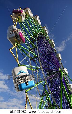 Ferris Wheel ride at amusement park View Large Photo Image Stock Image - Ferris Wheel ride at amusement park. Fotosearch