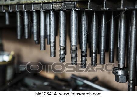 Hanging screws View Large Photo Image Picture - Hanging screws. Fotosearch
