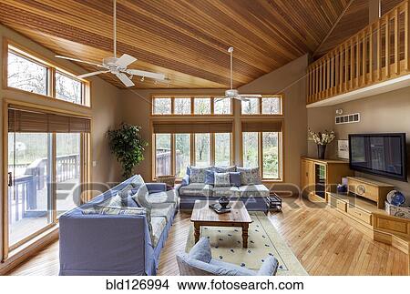 Hardwood floor and ceilings in living room View Large Photo Image Picture - Hardwood floor and ceilings in living room. Fotosearch