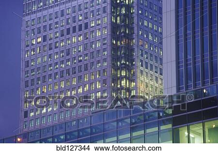 High rise office building illuminated at dusk View Large Photo Image Picture - High rise office building illuminated at dusk. Fotosearch