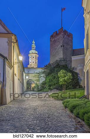Stock Image - Illuminated alley and tower, Mikulov, Southern Moravia, Czech Republic. Fotosearch
