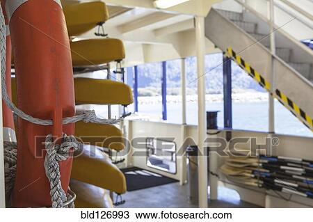 Lifeboats and life ring on ferry View Large Photo Image Stock Image - Lifeboats and life ring on ferry. Fotosearch