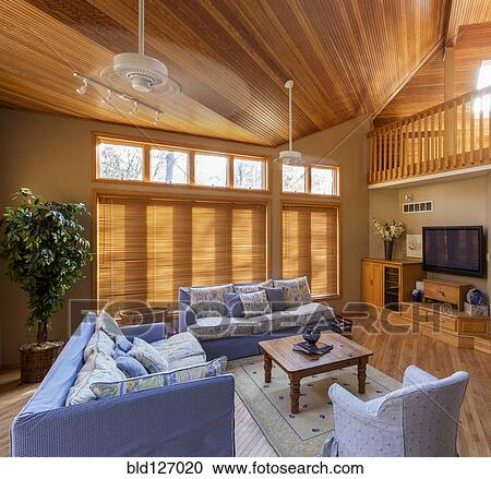 Living room with wooden blinds, hardwood floors and ceiling View Large Photo Image Stock Image - Living room with wooden blinds, hardwood floors and ceiling. Fotosearch