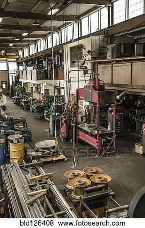 Stock Photo - Machinery in metal shop. Fotosearch