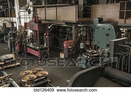 Machinery in metal shop View Large Photo Image Stock Photo - Machinery in metal shop. Fotosearch