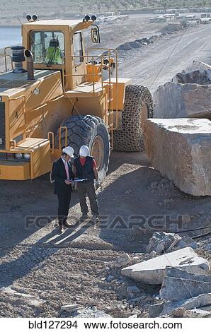 manager and worker in marble quarry View Large Photo Image Picture - manager and worker in marble quarry. Fotosearch