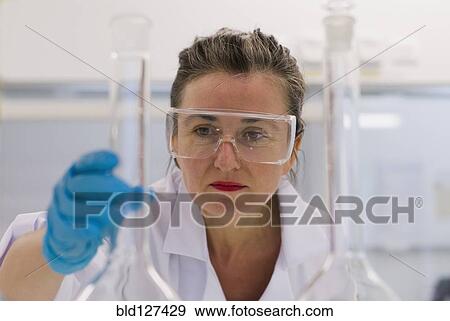 Mature woman in laboratory View Large Photo Image Stock Photo - Mature woman in laboratory. Fotosearch