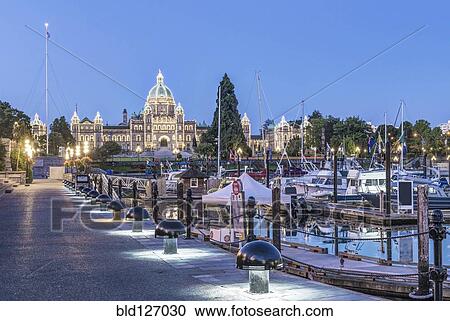 Parliament Buildings and harbor illuminated at dawn, Victoria, British Columbia, Canada View Large Photo Image Stock Image - Parliament Buildings and harbor illuminated at dawn, Victoria, British Columbia, Canada. Fotosearch