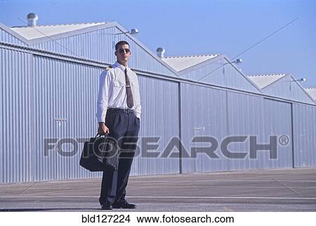 Picture - Pilot on tarmac portrait. Fotosearch