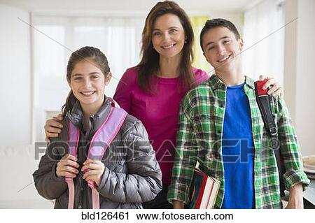 Portrait of Caucasian mother and children with backpacks View Large Photo Image Stock Image - Portrait of Caucasian mother and children with backpacks. Fotosearch