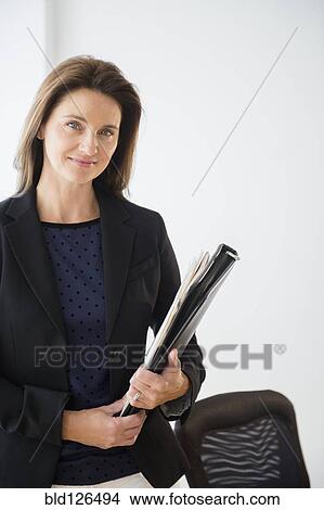 Picture - Portrait of confident Caucasian businesswoman. Fotosearch