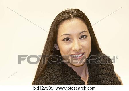Stock Photography - Portrait of young woman of Hispanic-Asian origin. Fotosearch