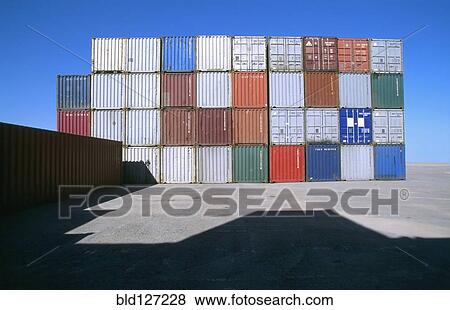 Row of shipping containers in port View Large Photo Image Stock Photo - Row of shipping containers in port. Fotosearch