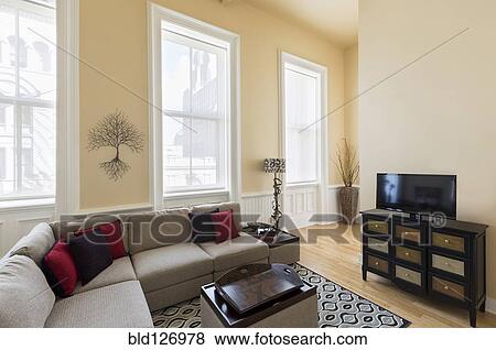 Stock Photo - Sectional sofa in modern living room. Fotosearch