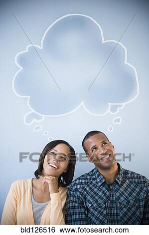 Shared thought bubble above pensive couple View Large Photo Image Stock Photograph - Shared thought bubble above pensive couple. Fotosearch