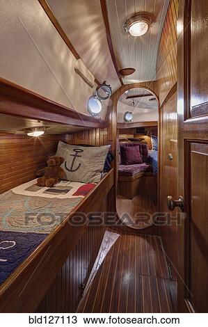 Stock Image - Sleeper in boat cabin. Fotosearch