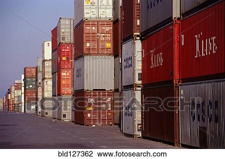 Stock Image - Stacked Lines of Cargo Containers at a Docks. Fotosearch